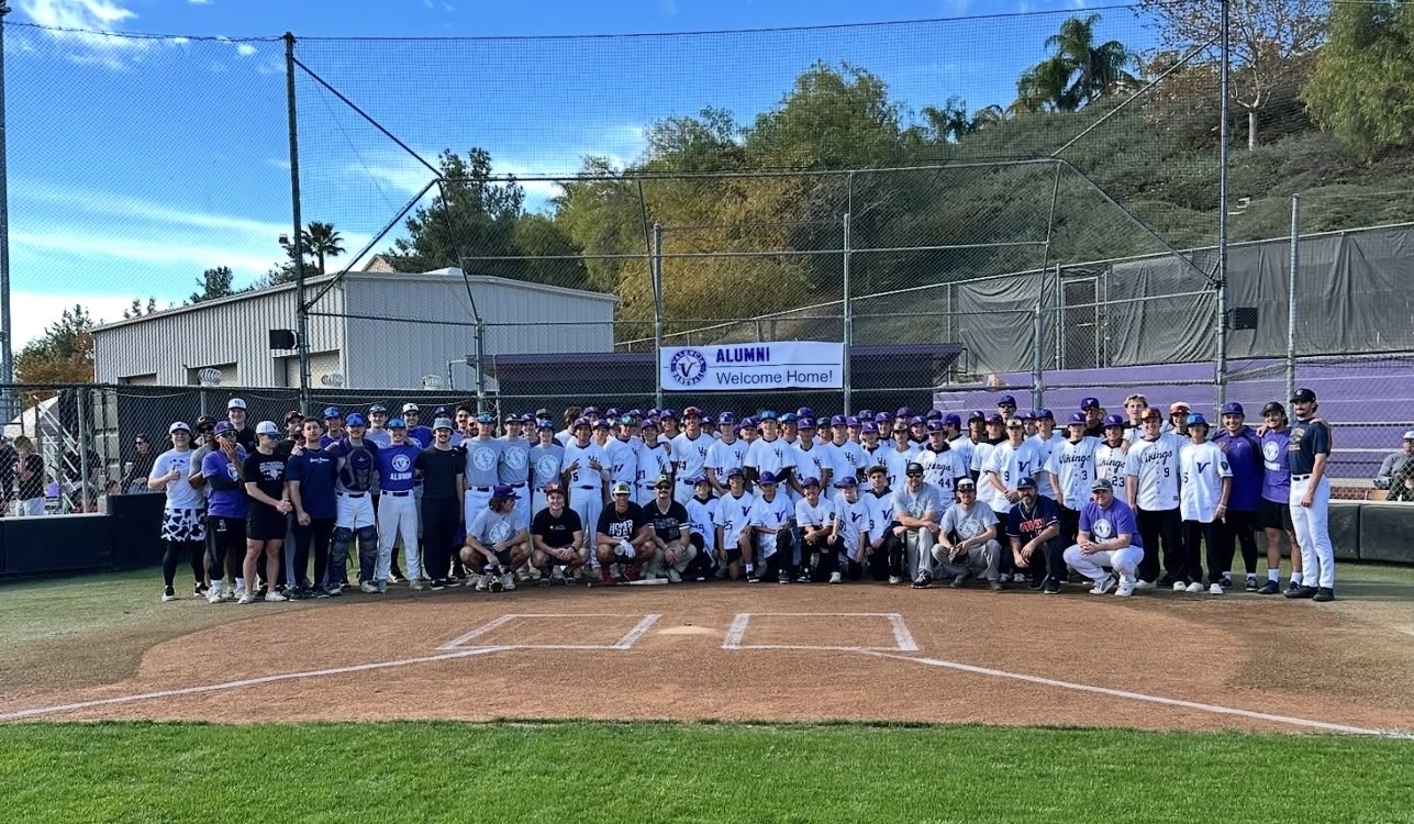 Former Valencia players on the field at the 2024 Alumni Game