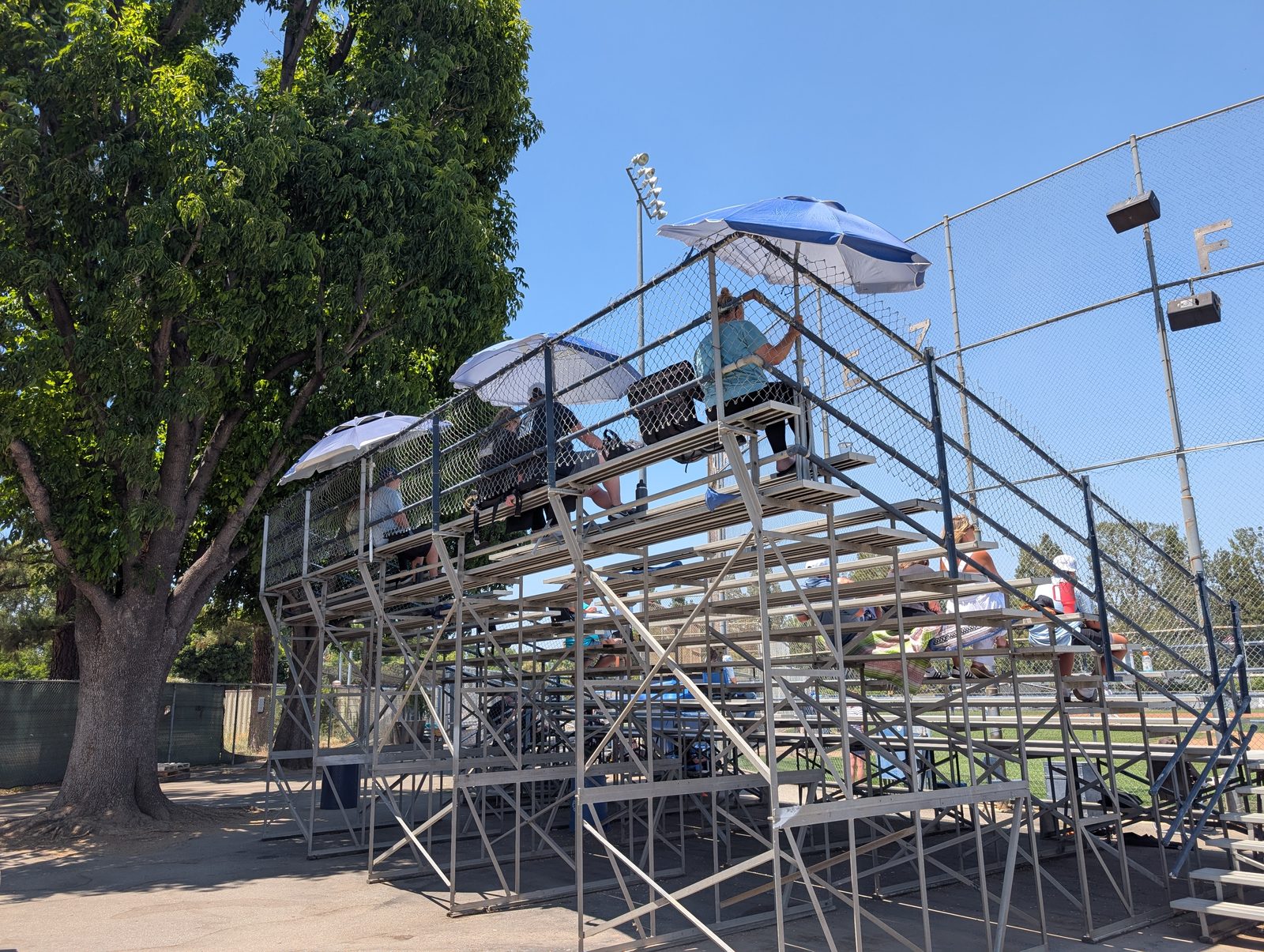 The large grandstand behind home plate, the best, cleanest view. Bring stadium chairs.