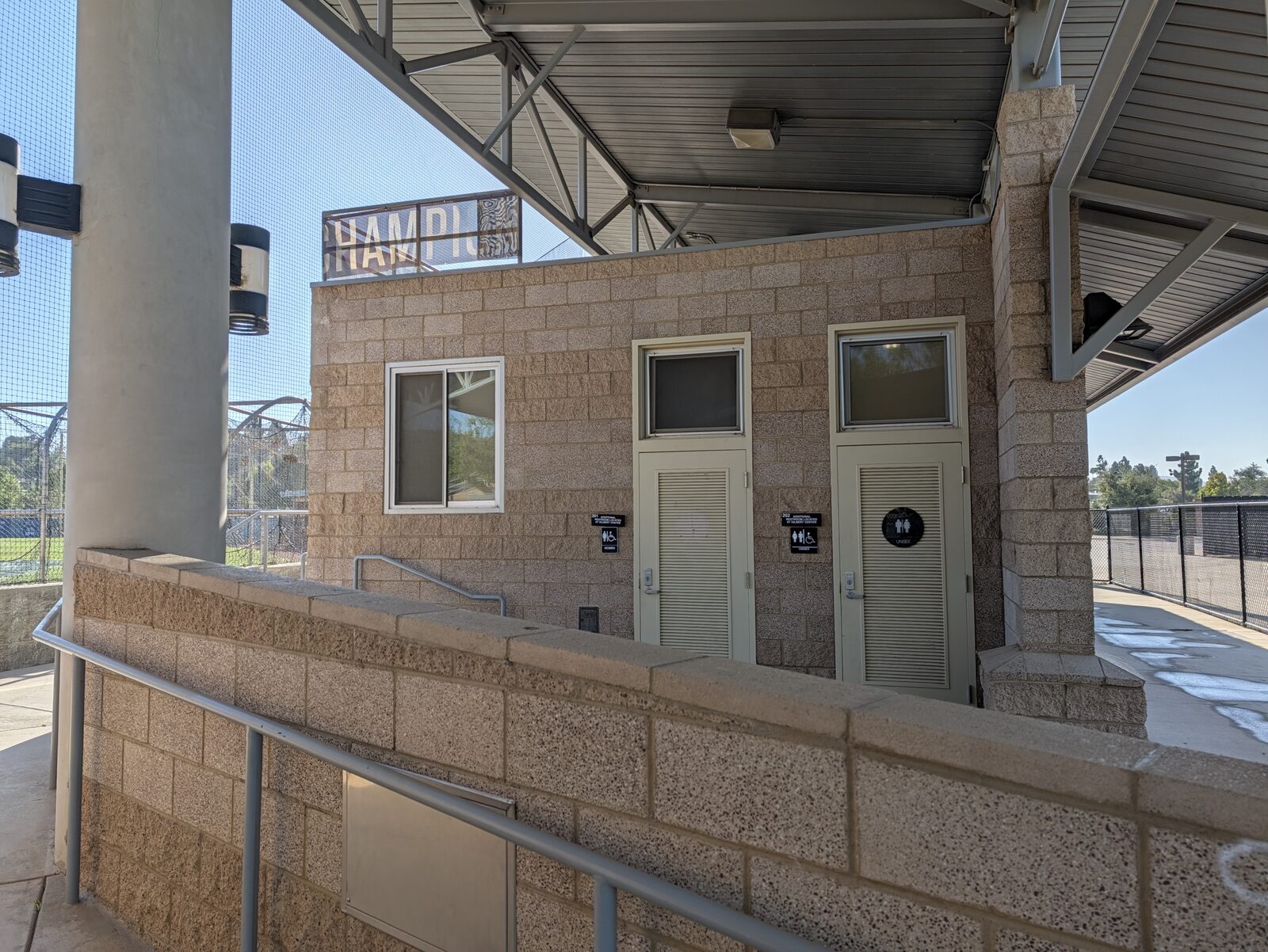 The restrooms, attached to the press box behind home plate. 201 Women and 202 Unisex, and that is all there is at the field.