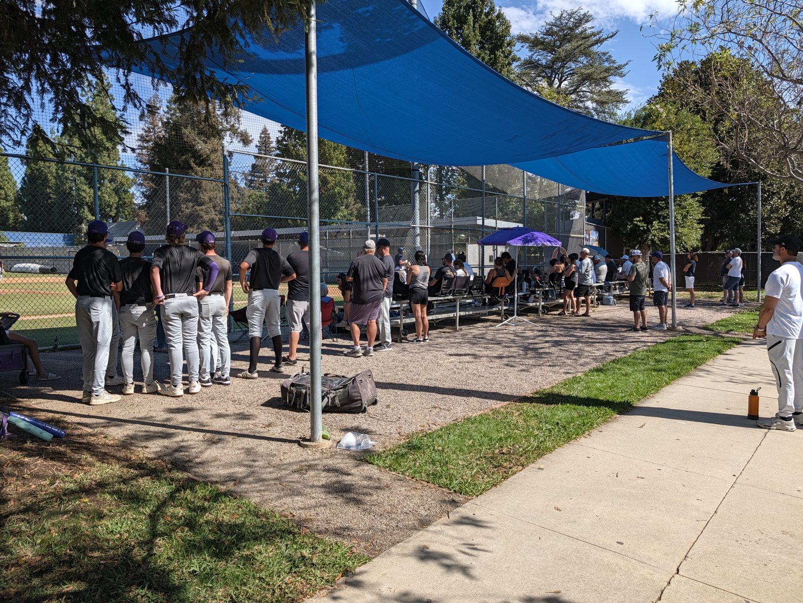 The bleachers from home plate to the third-base dugout. Everybody sits together.