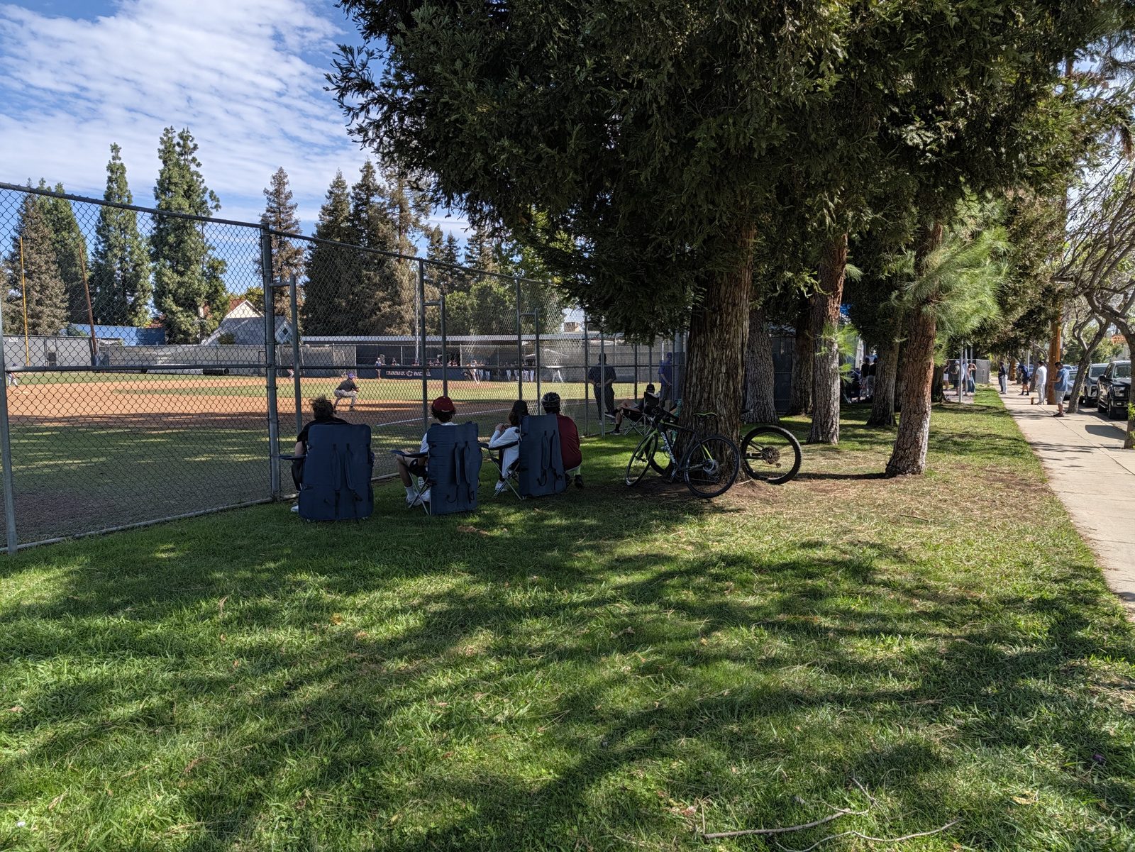 Seating along the left-field fence. Bring your own chair.