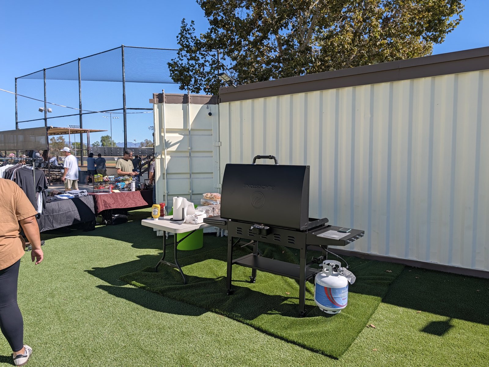 The griddle going outside the trailer. Burgers at 11:45 on a Saturday.